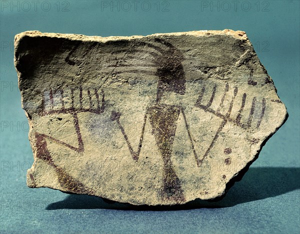 Fragment of a bowl decorated with a ceremonial dance