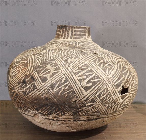 Chacomy white ware pitcher decorated with geometric design