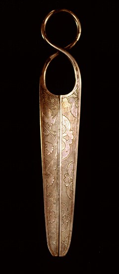 This pair of silver scissors illustrates some of the techniques introduced during the Tang dynasty from Persia