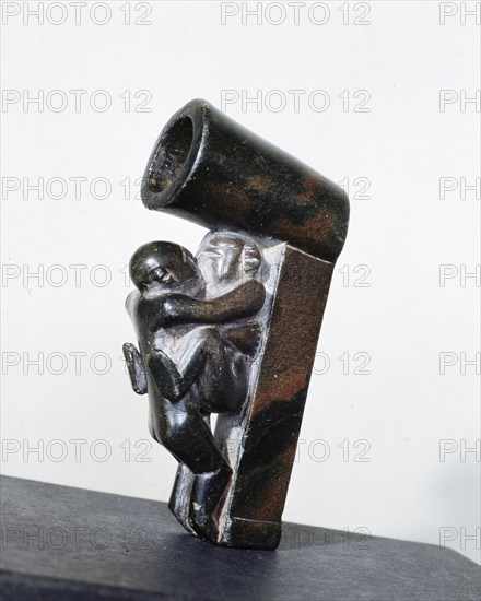 Ceremonial stone pipe with erotic scene