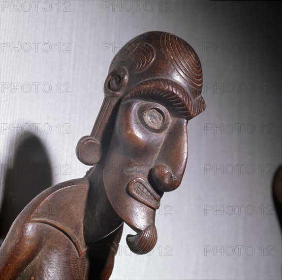 An ancestral figure known as a moai kavakava, emaciated man, worn hung onto its owner at dances and feasts