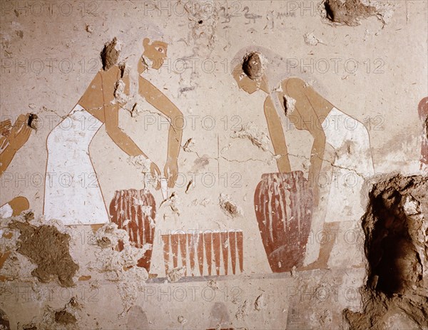 A painting detail in the tomb of Senet showing bread making