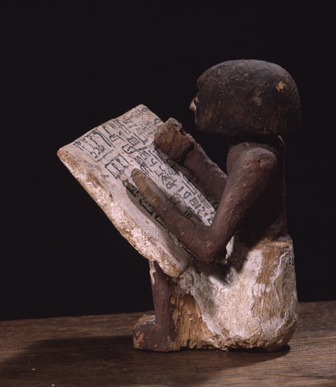 Wooden model of a scribe