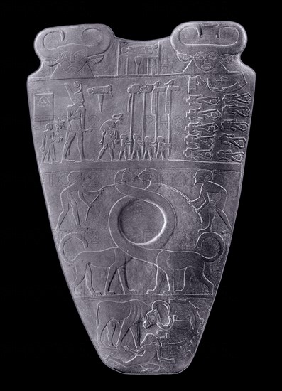 The obverse of the Narmer Palette which commemorates the victories of King Narmer identified as King Menes, the unifier of Upper and Lower Egypt