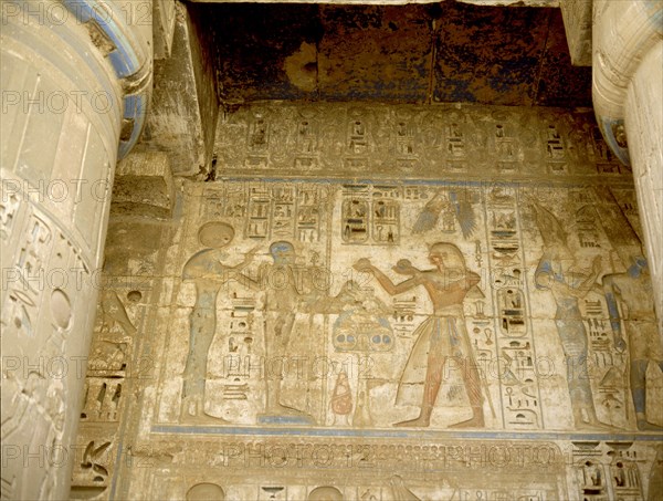 The pharaoh Ramesses III offering to the god Osiris
