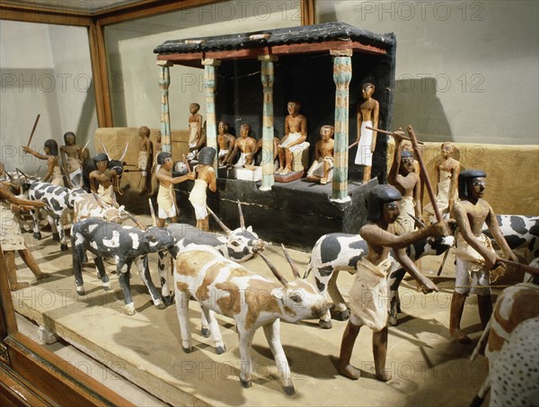 Wooden model depicting the tomb owner Meketre and his son, assisted by scribes and herdsmen, inspecting and counting his livestock