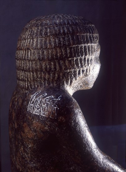 A statue of the priest, Hetepdief, kneeling