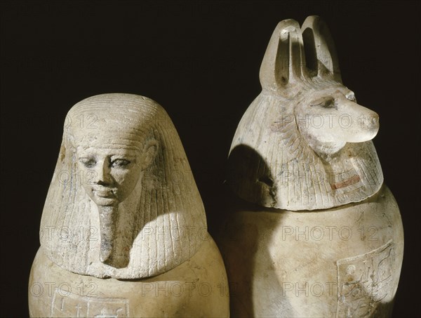 Two of a set of four canopic jars used to preserve the internal organs of Prince Hornakht each in the form of one of the Four Sons of Horus