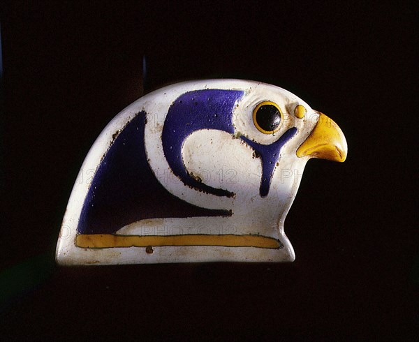 Glass falcon head, the terminal from a collar