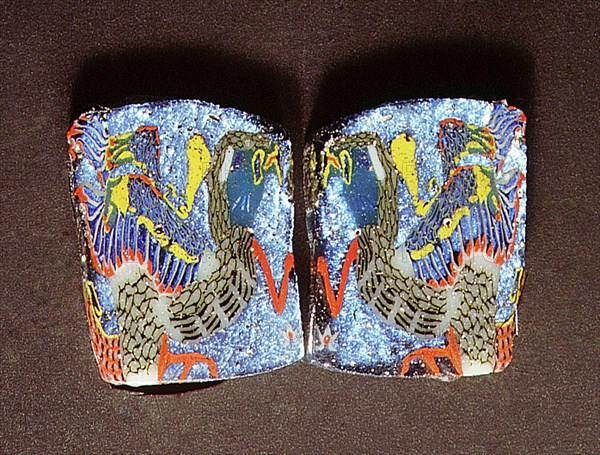 Two identical glass fragments decorated with a lapwing