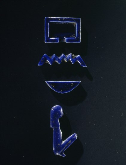 Four blue glass furniture inlay in the form of hieroglyphic signs making up the name Per neb