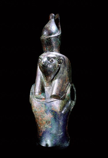 Fragment of statue depicting Horus wearing the double crown of upper and lower Egypt