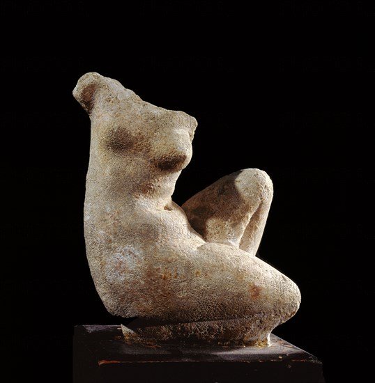 Torso of a statue of a kneeling woman, probably a copy of a bathing Aphrodite