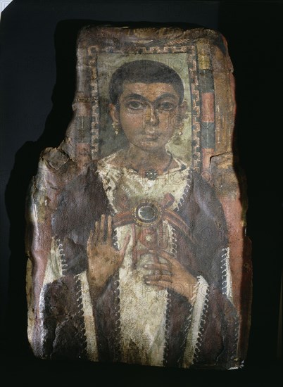 Portrait of a young girl holding an ankh and wearing a sun symbol flanked by cobra heads