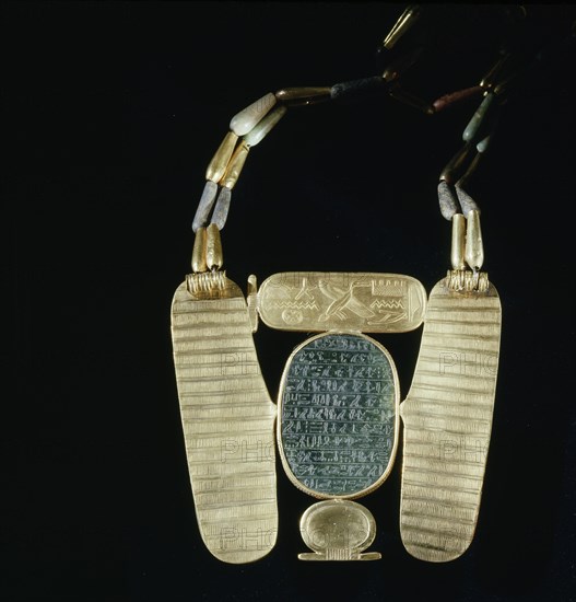 Winged scarab pectoral on bead chain, from the tomb of Psusennes I