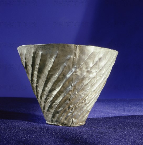 Fluted silver drinking vessel, one of a collection of silver objects presented by Amenemhat II to the temple at Tod, south of Luxor