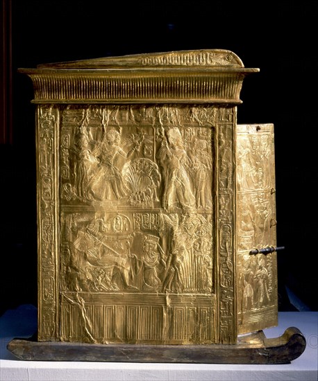 The little golden shrine of Tutankhamun containing the pedestal with the kings nomen and prenomen