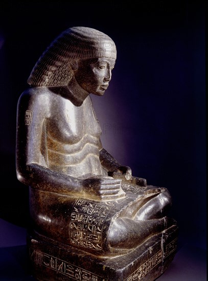 Statue of the influential minister of Amenhotep III, Amenhotep son of Hapu, as a scribe