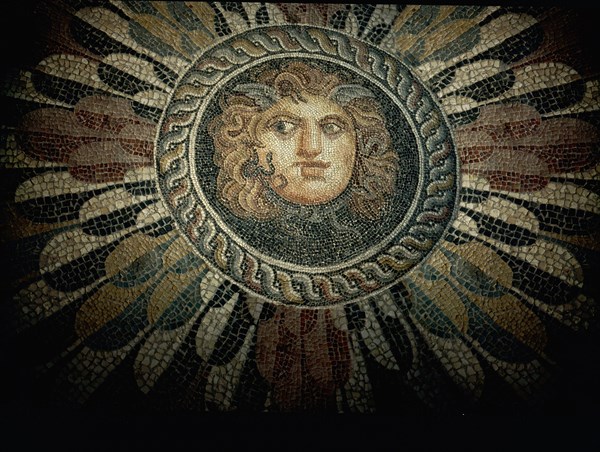 Mosaic floor of the head of Medusa with winged brow