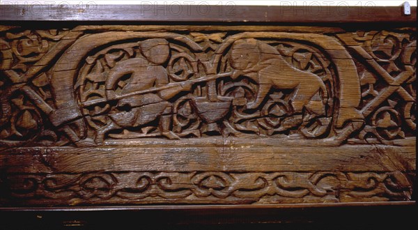 Wood plank with daily life scenes in the Fatimid court