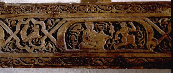 Wood plank with daily life scenes in the Fatimid court