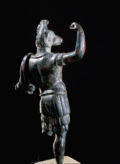 Miniature bronze figure of Hermanubis, a jackal headed deity wearing a cuirass and tunic