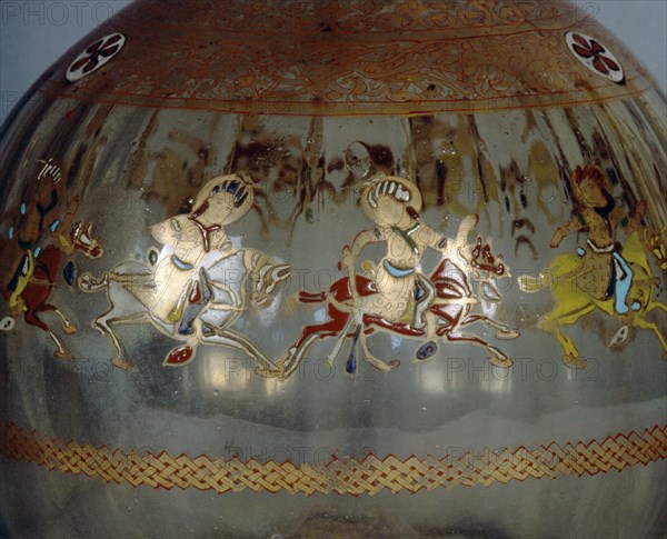 Mamluk glass hookah base decorated with images of polo players, Country of origin: Egypt