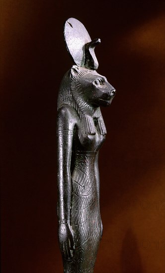 Bronze figure of the lion headed goddess Sekhmet with sun disc and uraeus