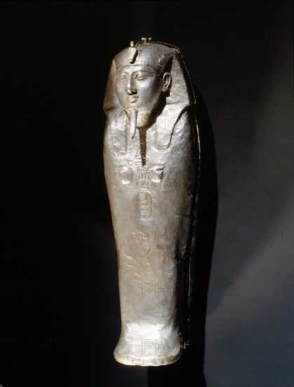 One of a set of four miniature silver canopic coffins used to preserve the internal organs of the king Shoshenq II