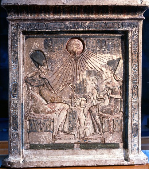 A relief on a stela showing an intimate family scene