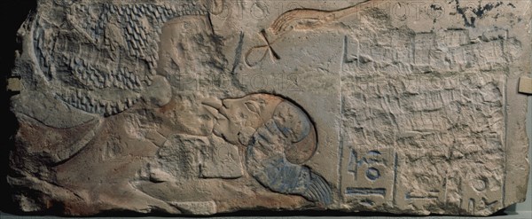 Relief showing Nefertiti kissing her daughter, perhaps Merytaten, under the rays of the Aten