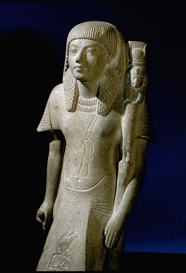 Statuette identified as either a priest of Hathor or of Mut, wife of the God Amun, found in the court of the temple of Amun at Karnak