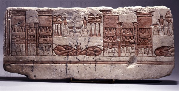 A fragment of a relief depicting animal and food offerings