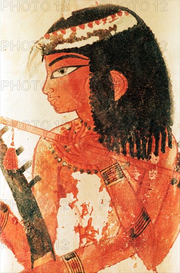 A detail of a painting from the tomb of Nakht depicting three female musicians