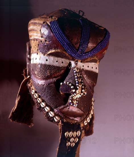 A helmet mask known as Mboom or Bwoom representing local pygmies, the common people, in a play retelling the myth of Bushoong royal origins, performed at major funerals, royal ceremonies and initiations