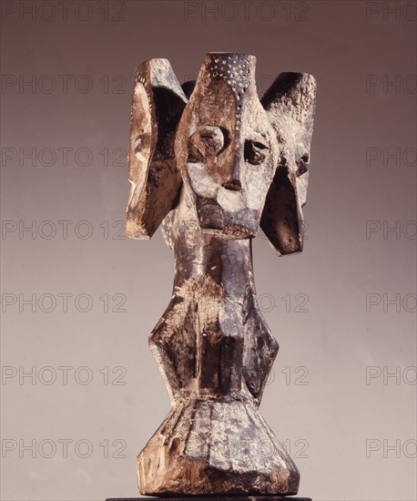 Four faced figure known as Sakimat wematwe