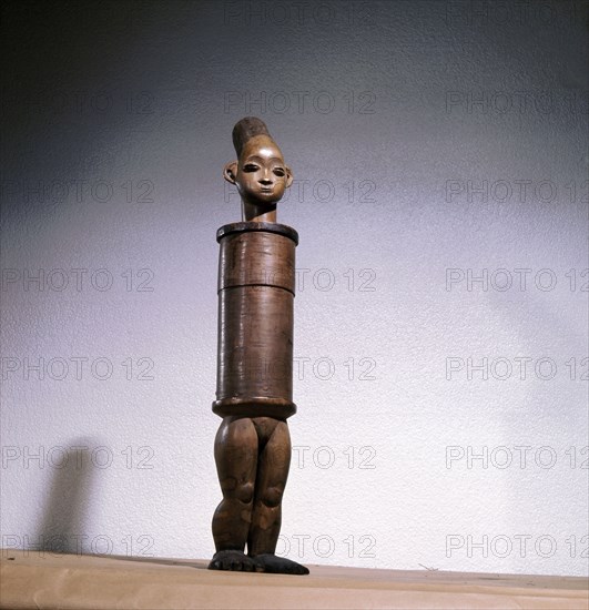 Anthropomorphic bark box, depicting the womens headdress and cranial modification achieved by binding the heads of babies among the Mangbetu