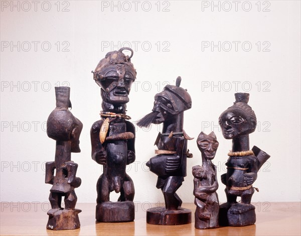 A collection of individual Songye power figures used to heal, to promote fertility, or to attack enemies using attached medicines