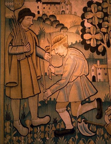 A detail of a tapestry depicting work in the vineyards