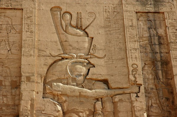 Outer wall of the Pylon relief depicting Horus the Elder wearing the crowns of upper and lower Egypt