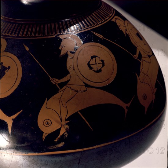 Detail of a vase showing a dolphin and rider