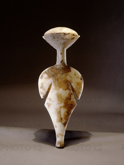 Cycladic figurine   star gazer, it belongs to the Louros type of the Grotta Pelos culture