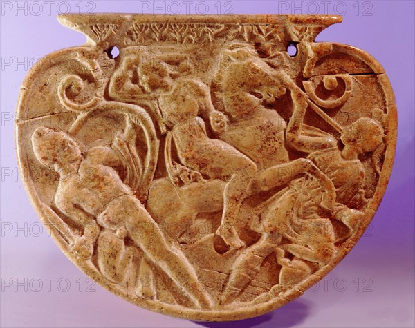 Hellenistic ivory sword chape (the end of a scabbard) showing a battle between Greeks and Amazons