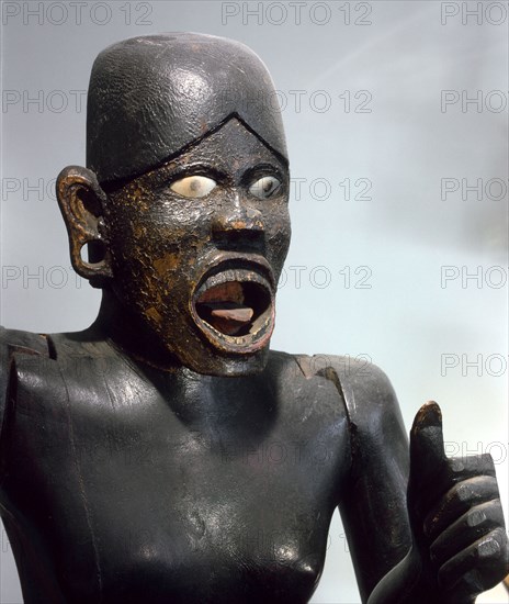 A life size guardian figure   possibly from a graveyard   meant to ward off evil spirits