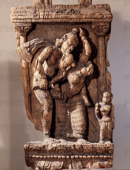 An erotic carving from a temple car