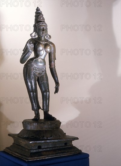 Statue of Parvati identified by the tall conical crown (katakamundra), reincarnation of Sati and consort of Shiva