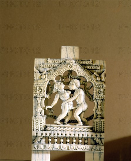 An ivory panel, probably from a bed or a swing, carved with a tantric scene