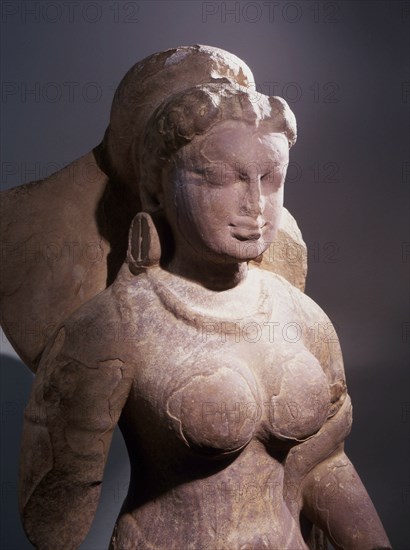 Statue of a goddess, possibly Parvati, standing in samapada (literally without bending)