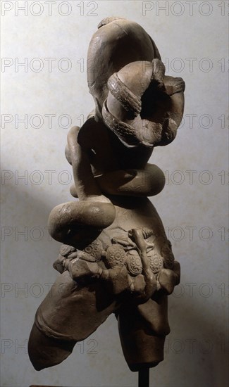 Terracotta statue of serpent goddess