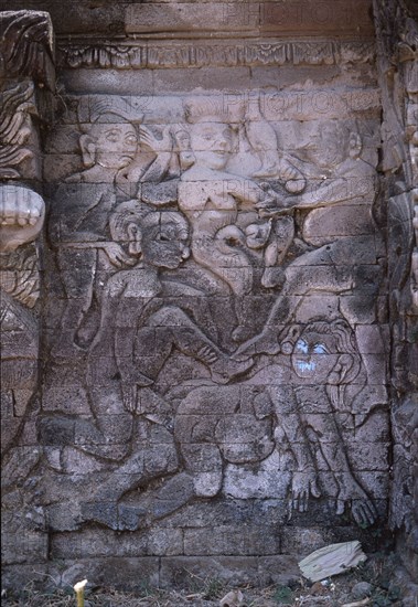 Stone relief on a temple wall at Sangsit, Buleleng